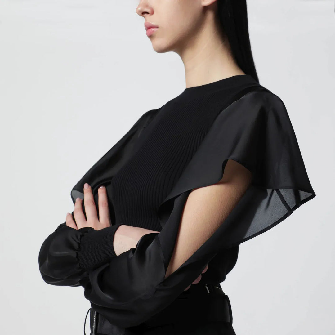 Sacai - Black knit top with semi-sheer sleeves