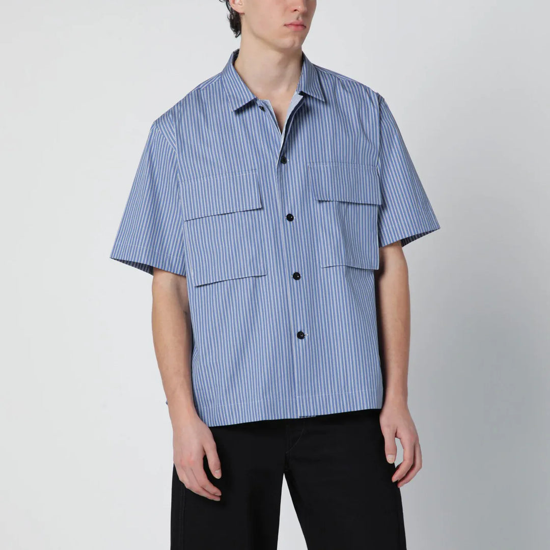 Sacai - Light blue striped cotton shirt Brand Apparel & Accessories > Clothing > Shirts & Tops 2